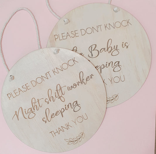 'Please don't knock' signs